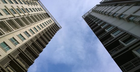 skyscraper building with blue sky background