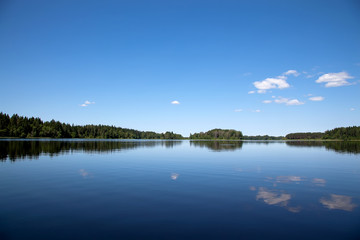 Fototapeta na wymiar blue sky blue lake