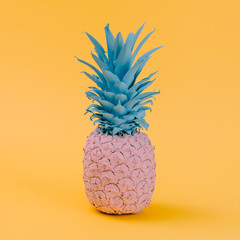 Pink pineapple on yellow background. Minimal style. Food concept