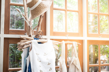 Clothes and Boater hat. Soft focus with flaes in vintage style.