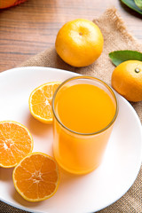 Juicy oranges slices on wooden table. 