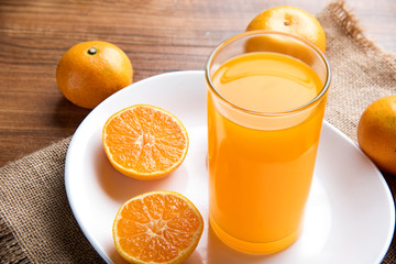 Juicy oranges slices on wooden table. 