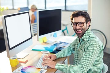 Graphic designer working on computer