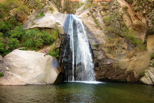 Fototapeta Long shot of a waterfall on the Cascadas del rio Colorado Trek close to Cafayate in Argentina, South America