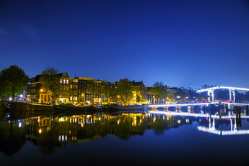 Amsterdam city view with canals and bridges