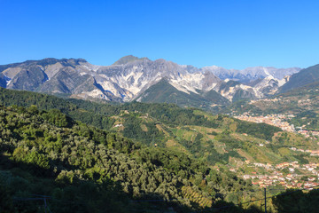 Panoramic view of Alpi Apuane mountain chain in Tuscany, Italy