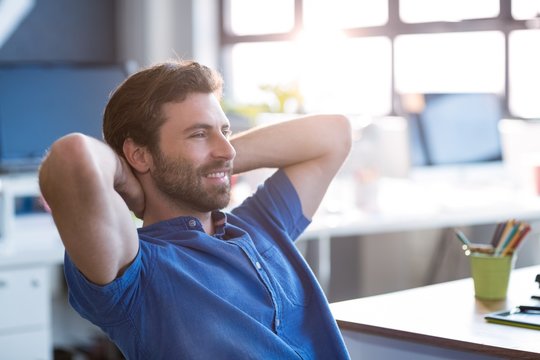 Graphic designer sitting in office