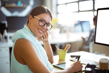 Graphic designer using graphics tablet