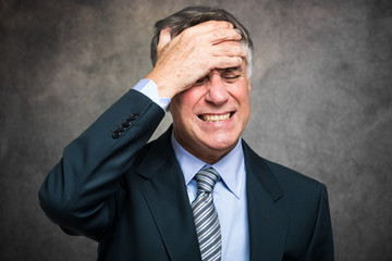 Portrait of a worried and stressed businessman