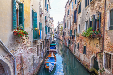 Naklejka na ściany i meble Narrow canal in Venice