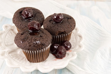 Dark chocolate muffins in paper cups