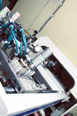 Detail of silk-screen printing machine