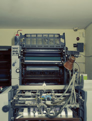 Offset printing machine in basement room