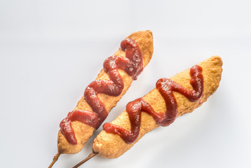 Corn dogs on the white background