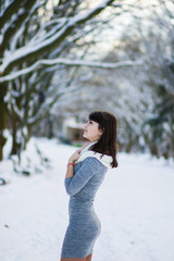 The girl with a beautiful figure poses in Winter Park