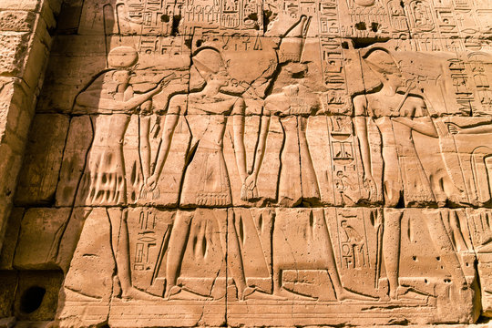 LUXOR, EGYPT  Ancient ruins of Karnak temple in Egypt at noon. The complex is a vast open-air museum, and the second largest ancient religious site in the world