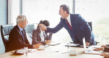 Businessman scolding his colleague