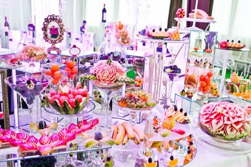 Awesome wedding reception of food and drink with various pink light