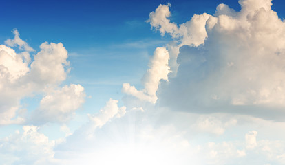 blue sky with rainy clouds