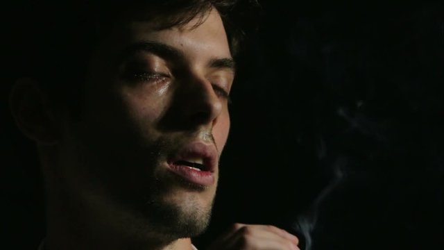 desperate man smoking: depression, fear, sadness, loneliness, dark