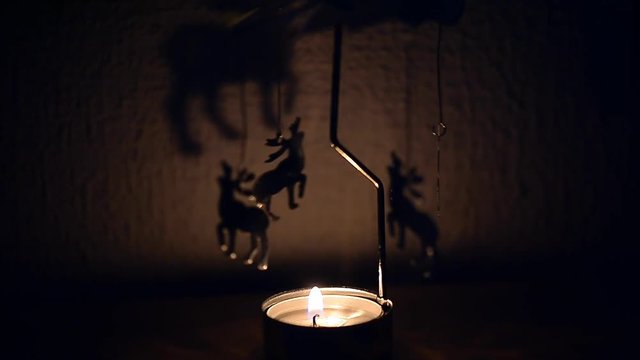 Stag, running on the wall. The light from the candles. The feeling of celebration and comfort