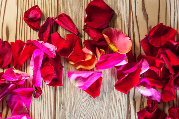 Naklejka na ściany i meble Roses on rustic wooden board,Valentines Day background.