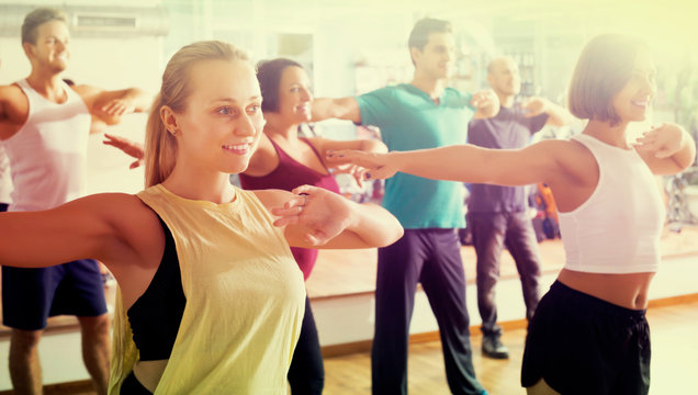 Men and ladies dancing zumba