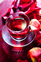 Red Hibiscus tea in glass mug