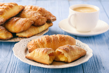 Homemade sweet buns with vanilla cream filling.