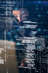 Woman in balaclava using laptop 3D