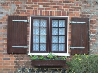 Fototapeta na wymiar window with wooden shutter 