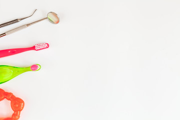 prevention and care children's teeth white background top view