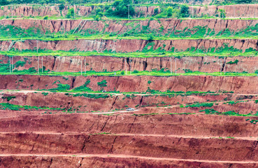 Part of a pit with big mining truck working