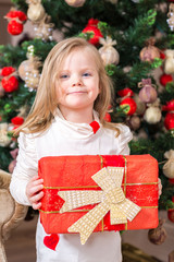 Little girl with Christmas present