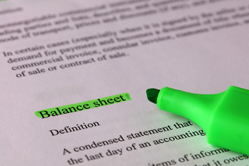 Balance sheet definition and meaning in business dictionary. Business concept.