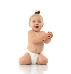 Infant child baby girl toddler sitting smiling laughing looking