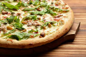 Four cheese pizza quattro fromaggi with mashrooms ham bacon meat
