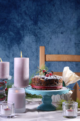 Festive holiday table with English style Christmas fruit cake