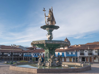 Fototapeta na wymiar Manco Capac water fountain golden statue.