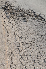 Asphalt road surface crack.
