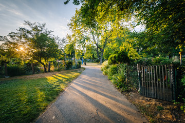 Walkway and gardens at sunset, at Back Bay Fens, in Boston, Mass