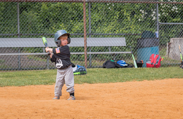 Child Playing Baseball
