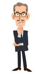 スーツを着た年配の男性が考える