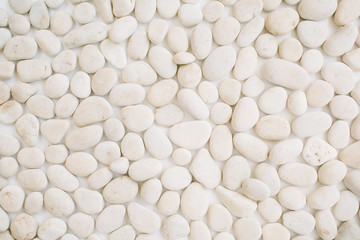 Neutral pattern of beige stones. Flat lay, top view