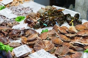 clams and crabs on ice in market in Venice city