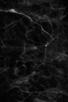 Black marble patterned texture background for design.