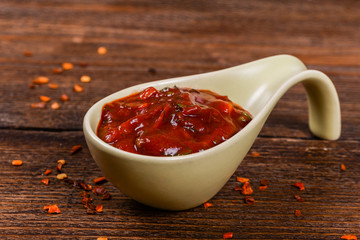 Red sauce on a wooden table