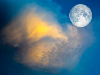 Fototapeta na wymiar full moon yellow cloud in the blue sky