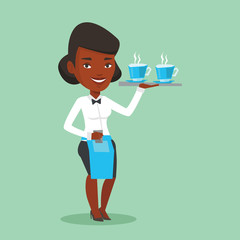 Waitress holding tray with cups of coffeee or tea.