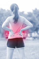  woman waist injury in park